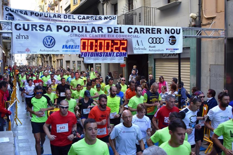 La Cursa Popular del Carrer Nou omple la ciutat de samarretes verdes a favor de Catalunya Contra el Càncer-Girona i del Rotary Club