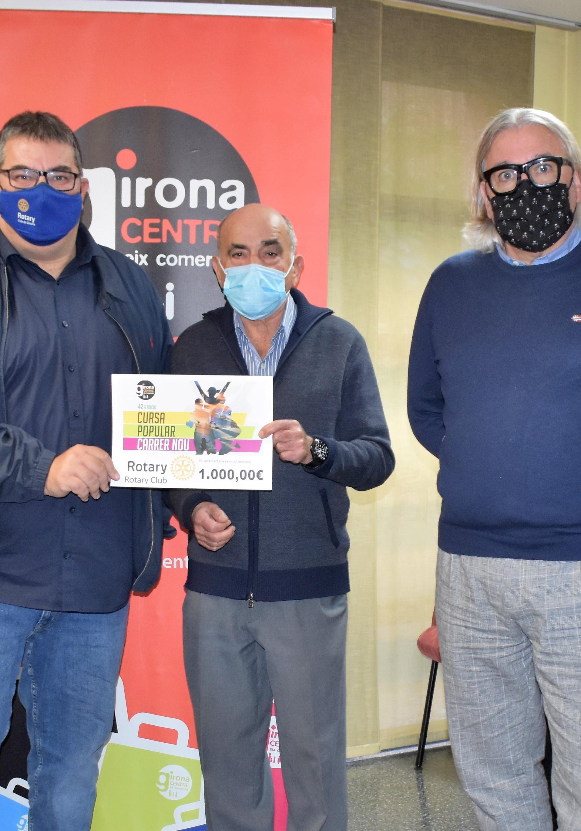 Donació de la cursa popular del Carrer Nou al Rotary Club de Girona