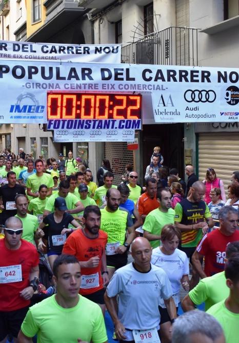 La Cursa Popular del Carrer Nou omple la ciutat de samarretes verdes a favor de Catalunya Contra el Càncer-Girona i del Rotary Club