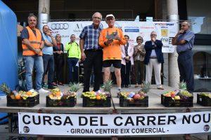 La Cursa Popular del Carrer Nou omple la ciutat de samarretes verdes a favor de Catalunya Contra el Càncer-Girona i del Rotary Club